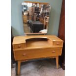 A 1960's Golden Key three drawer dressing chest with mirror