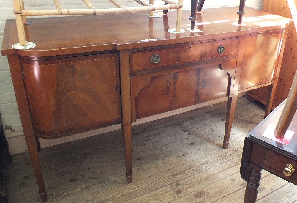 An Edwardian mahogany inlaid and cross banded sideboard with two cupboards and drawer