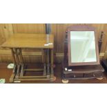 A nest of three oak tables and a swing toilet mirror with two drawers