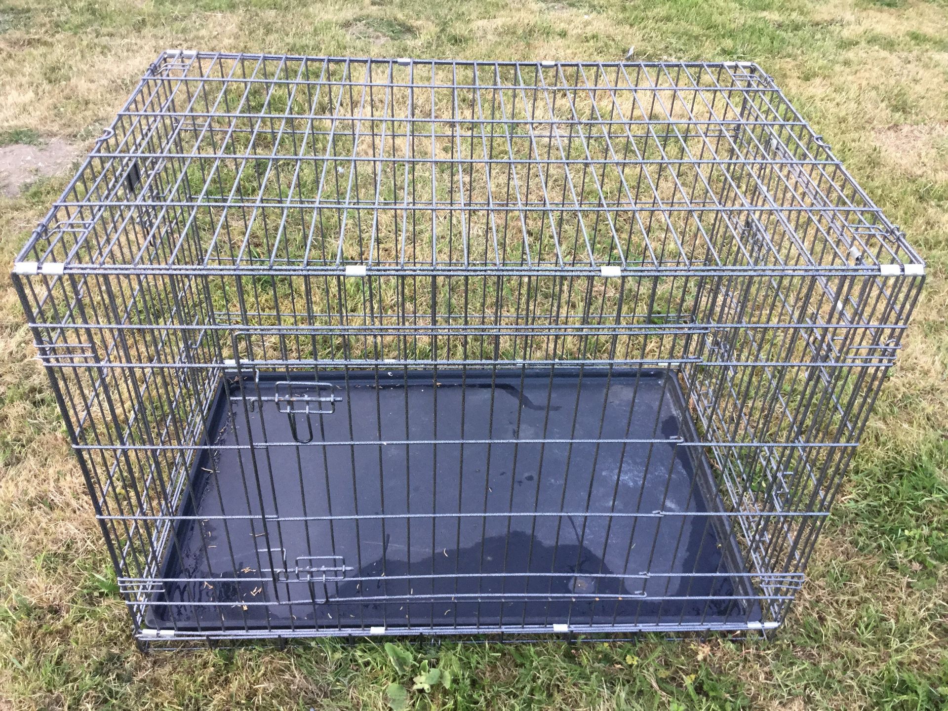Large dog cage as new. Cost £80. Stored at Hayward United Farmers, Beccles No VAT on this item.