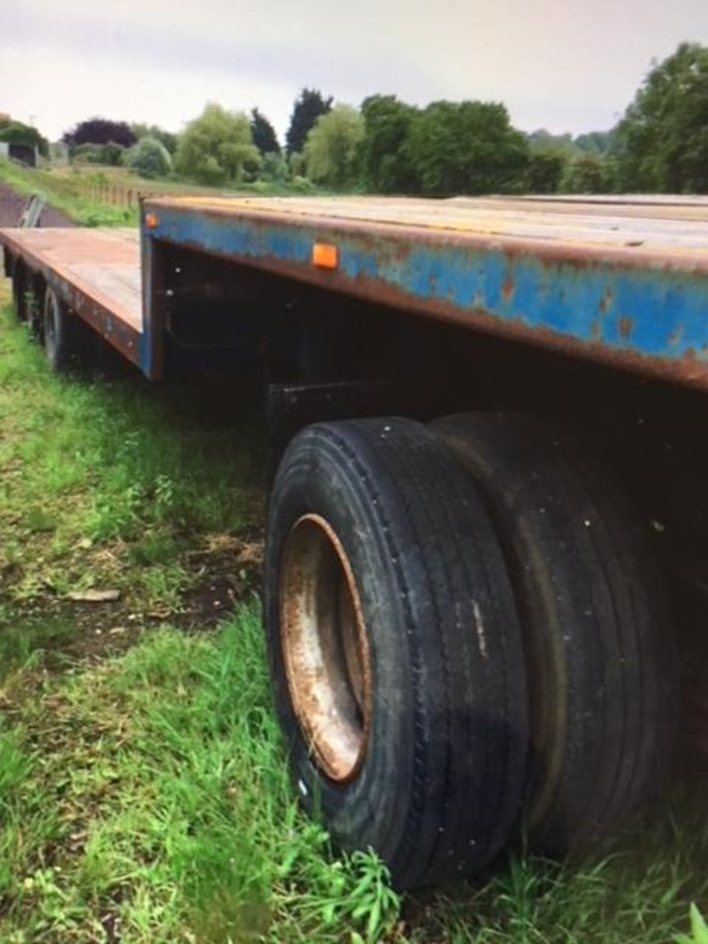 Step frame trailer 8m flat x 4m step, sound condition, hydraulic and air brakes. - Image 2 of 3