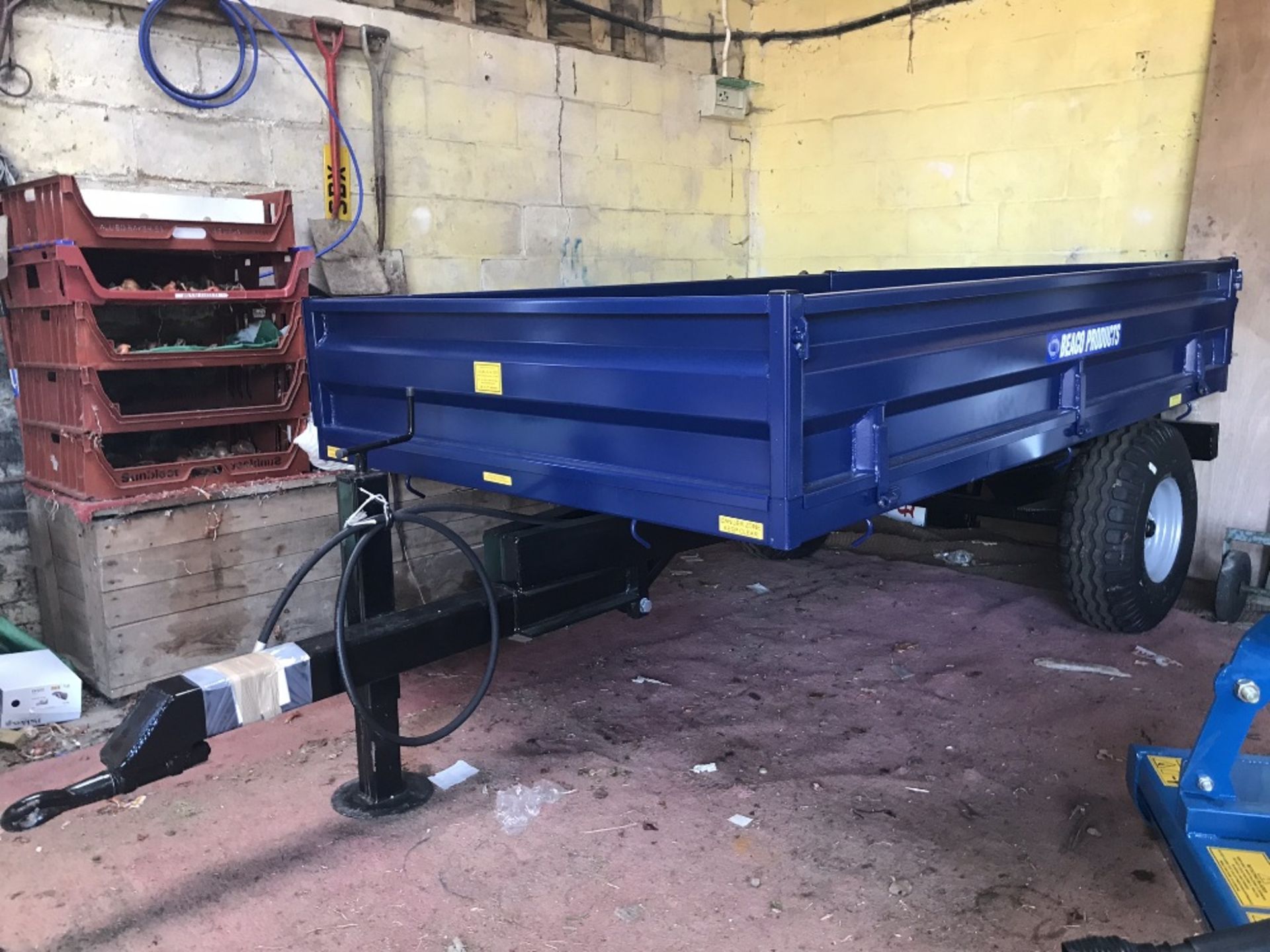 2T tipping trailer, drop sides. Stored near Woodbridge.