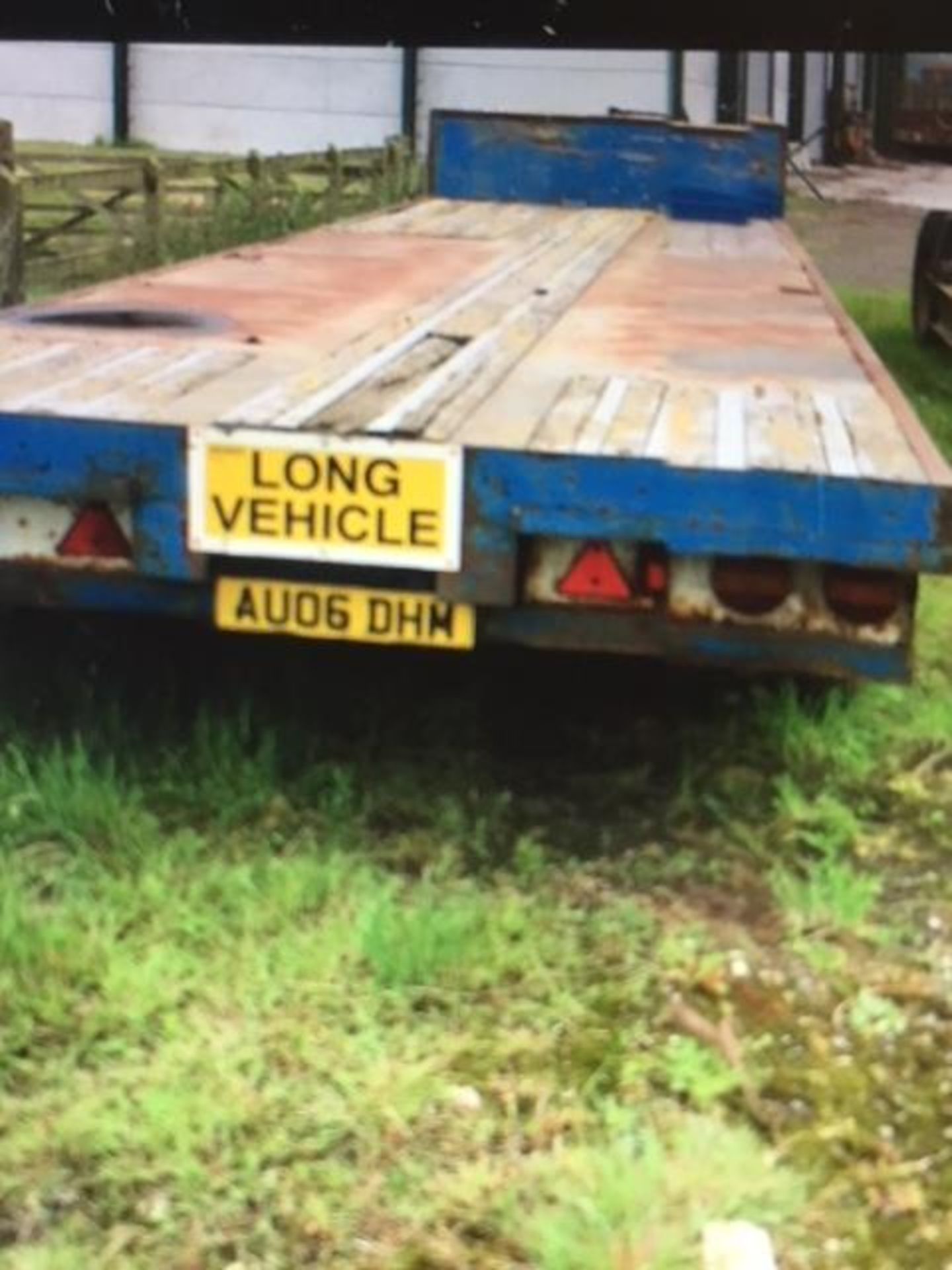 Step frame trailer 8m flat x 4m step, sound condition, hydraulic and air brakes.