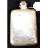 A silver hip flask,