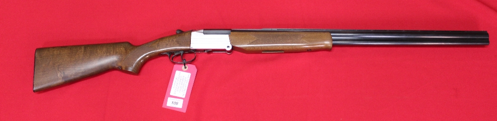 A folding O/U combination shotgun, 20 bore top barrel and .