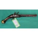 A Flinklock pistol with brass furniture and decorative stock,