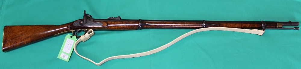 An 1853 three band Enfield .577 cal rifle, lock marked with Crown over V.R.