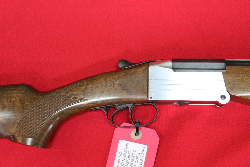 A folding O/U combination shotgun, 20 bore top barrel and . - Image 2 of 2