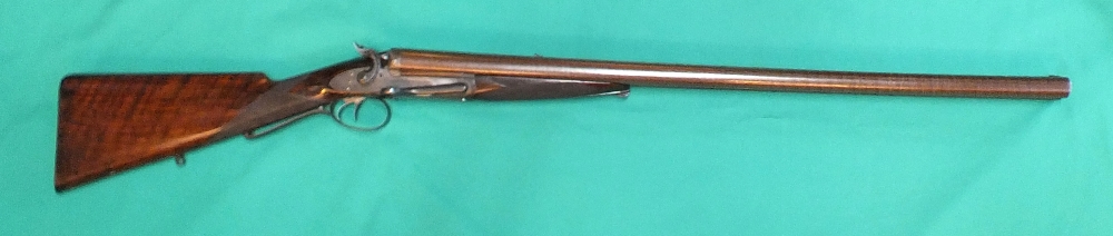 An 8 bore double barrel hammer shotgun by J.D.