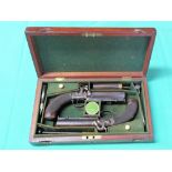 A cased pair of 'Manstoper' percussion belt pistols of approx 16 bore,