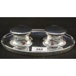 A silver double inkstand (with liners),