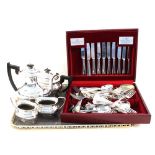 A silver plated four piece tea set plus various cutlery