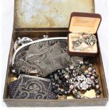 A vintage tin with contents including Art Deco chain mail purse,