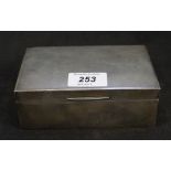 An engine turned silver cigarette box,