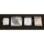 Four various engraved silver vestas,