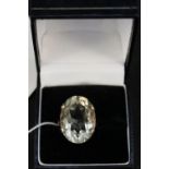 A 9ct gold ring set with large yellow stone,