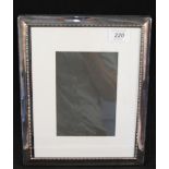 A modern large silver photo frame