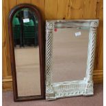 A carved wooden wall mirror plus three others