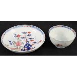 A Lowestoft Redgrave Imari pattern tea bowl and saucer (light body cracks to bowl)
