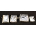 Four various engraved silver vestas