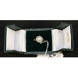 A 9ct gold pearl and diamond cluster ring (with certificate),