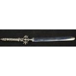 A silver paper knife with ornate handle,