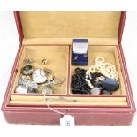 A collection of jewellery including tortoiseshell yellow metal overlay heart pendant,