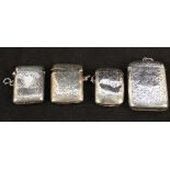 Four various engraved silver vestas, one with inscription,