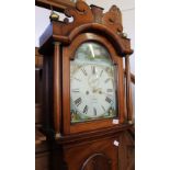 An eight day long case clock with painted dial marked W.R.