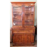 A Victorian mahogany glazed secretaire bookcase with fitted interior