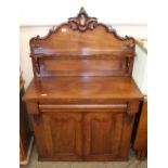 A Victorian mahogany chiffoniere with ornately carved shelf back