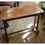 A Victorian bobbin turned occasional table with stretcher base