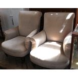 A pair of Victorian low armchairs with cream upholstery