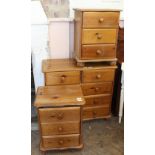 A modern pine chest of two short and three long drawers and two modern bedside three drawer chests