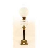 A brass Corinthian column oil lamp with cut glass bowl