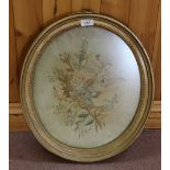 A 19th Century oval silkwork floral picture,