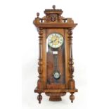 A mahogany Vienna regulator wall clock plus a Victorian copper warming pan