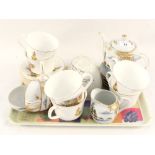 A Brown & Polsons china jelly mould plus Japanese eggshell and Gypsy Caravan part tea sets