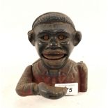 A cast iron 'Little Joe' mechanical money bank