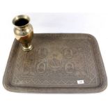 A brass vase and tray