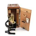 A cased microscope by F.