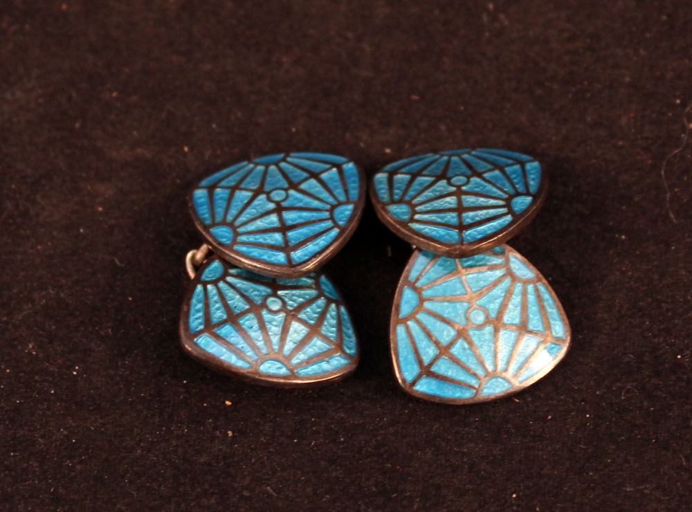 A pair of silver Charles Horner cufflinks with geometric blue enamel design