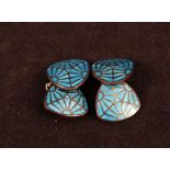 A pair of silver Charles Horner cufflinks with geometric blue enamel design