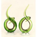 A pair of green glass design sculptures