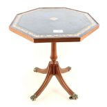 A mahogany octagonal top wine table