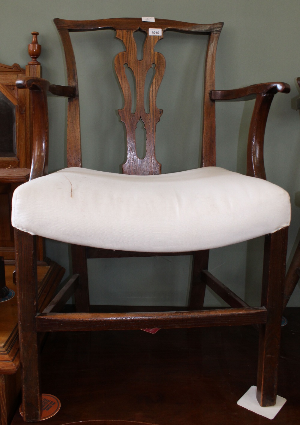 A 19th century country made Chippendale style elbow chair