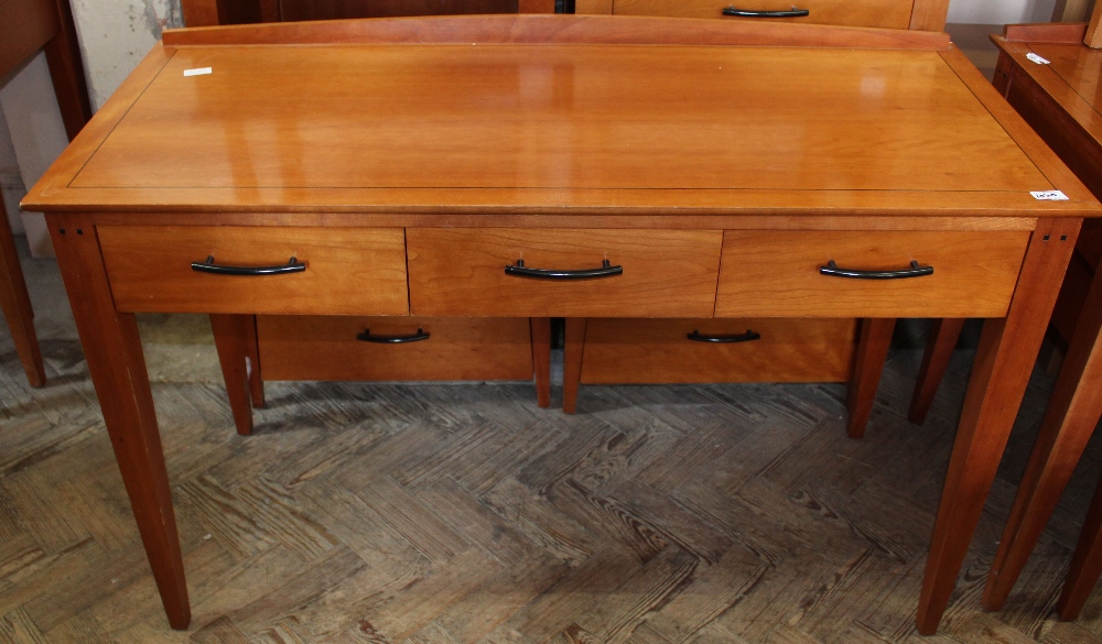 A modern three drawer writing desk