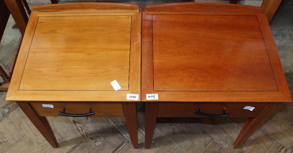 A pair of modern bedside tables with single drawers