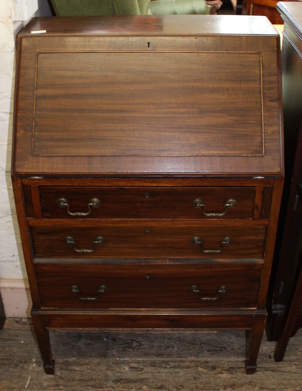 A narrow Edwardian mahogany bureau