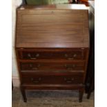 A narrow Edwardian mahogany bureau